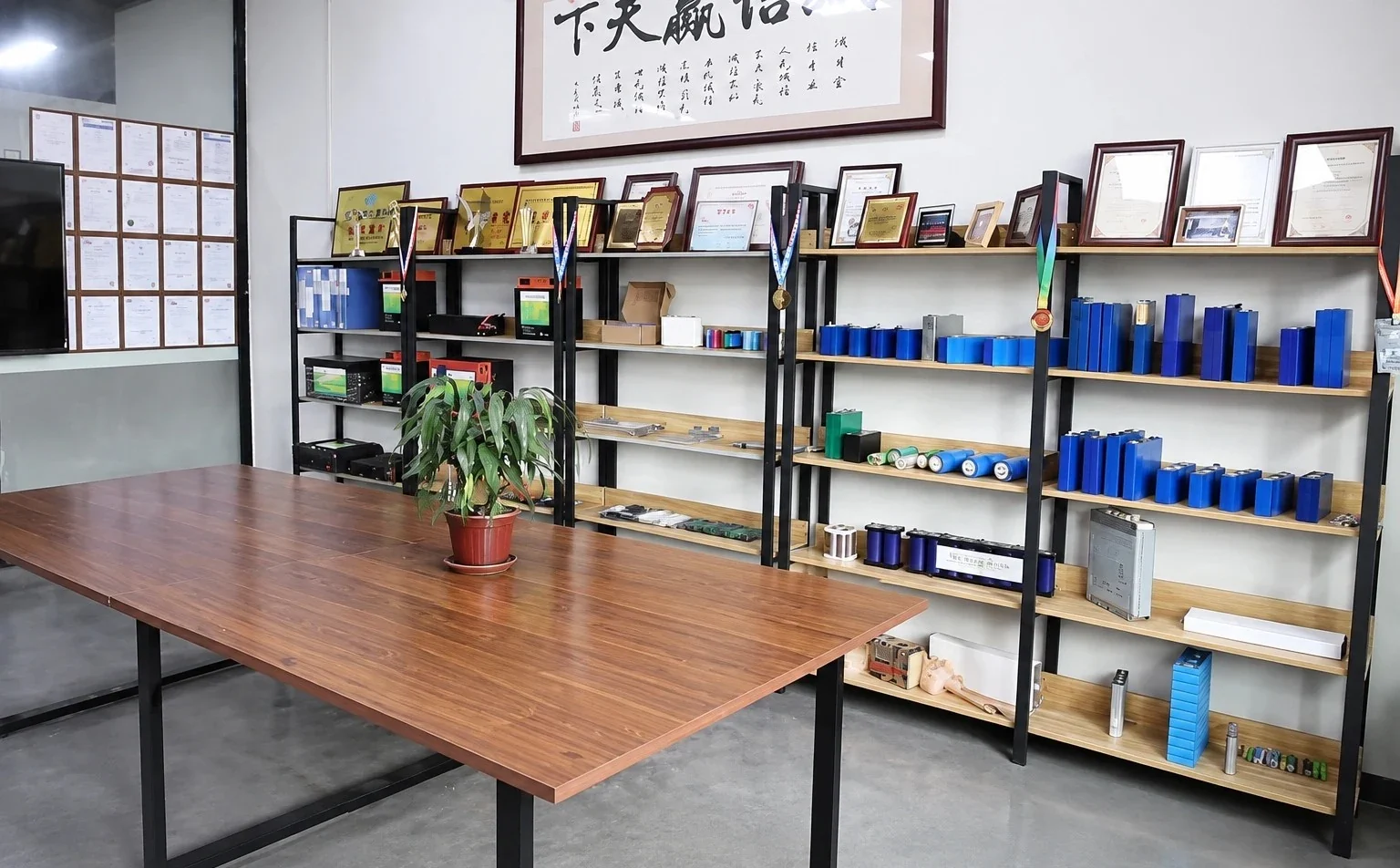 Certificates, CE and UN38.3 test reports and awards on display in HHPOWER's factory showroom